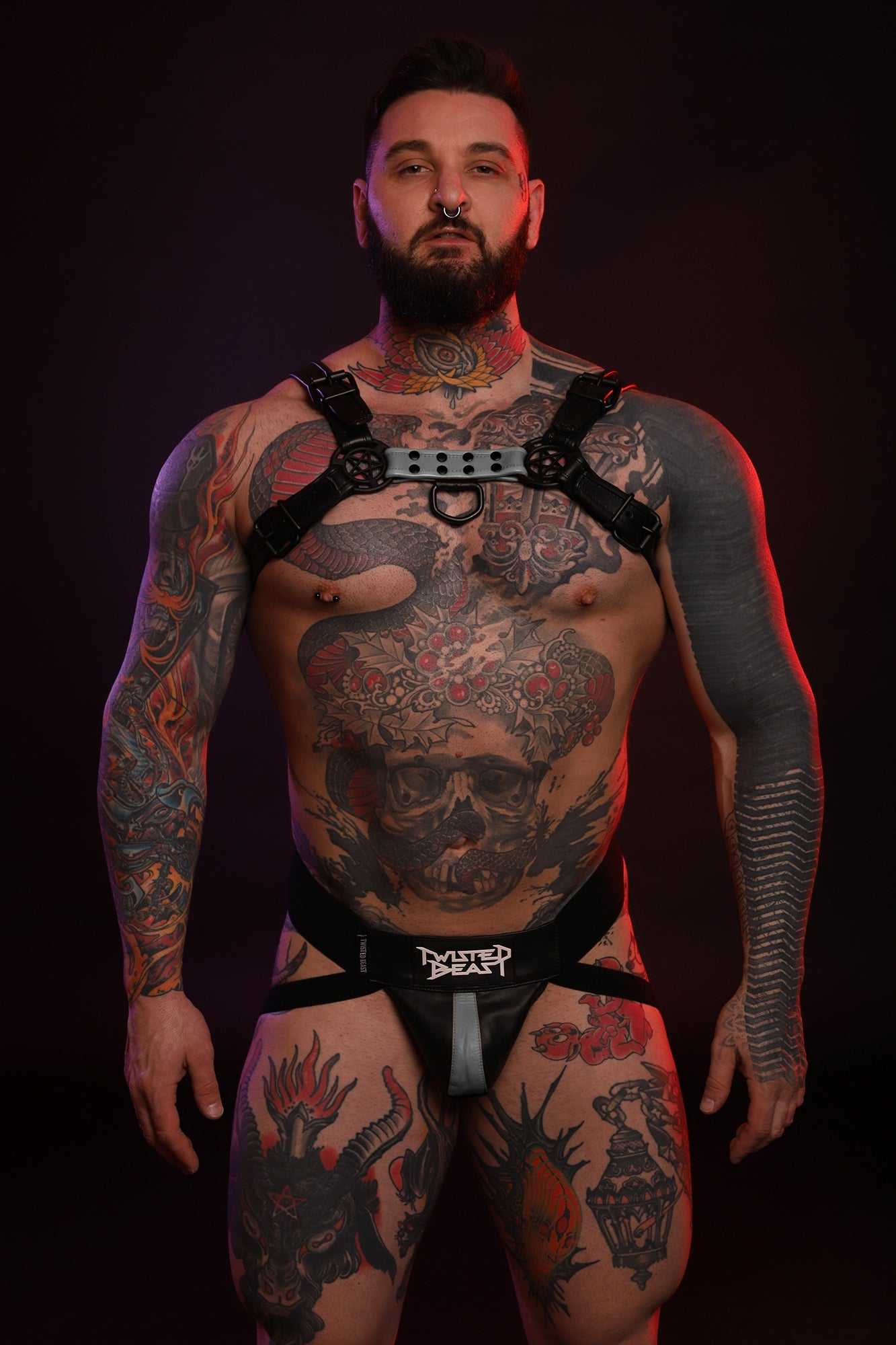 A frontal photo of a model wearing a Beast Jock in grey.