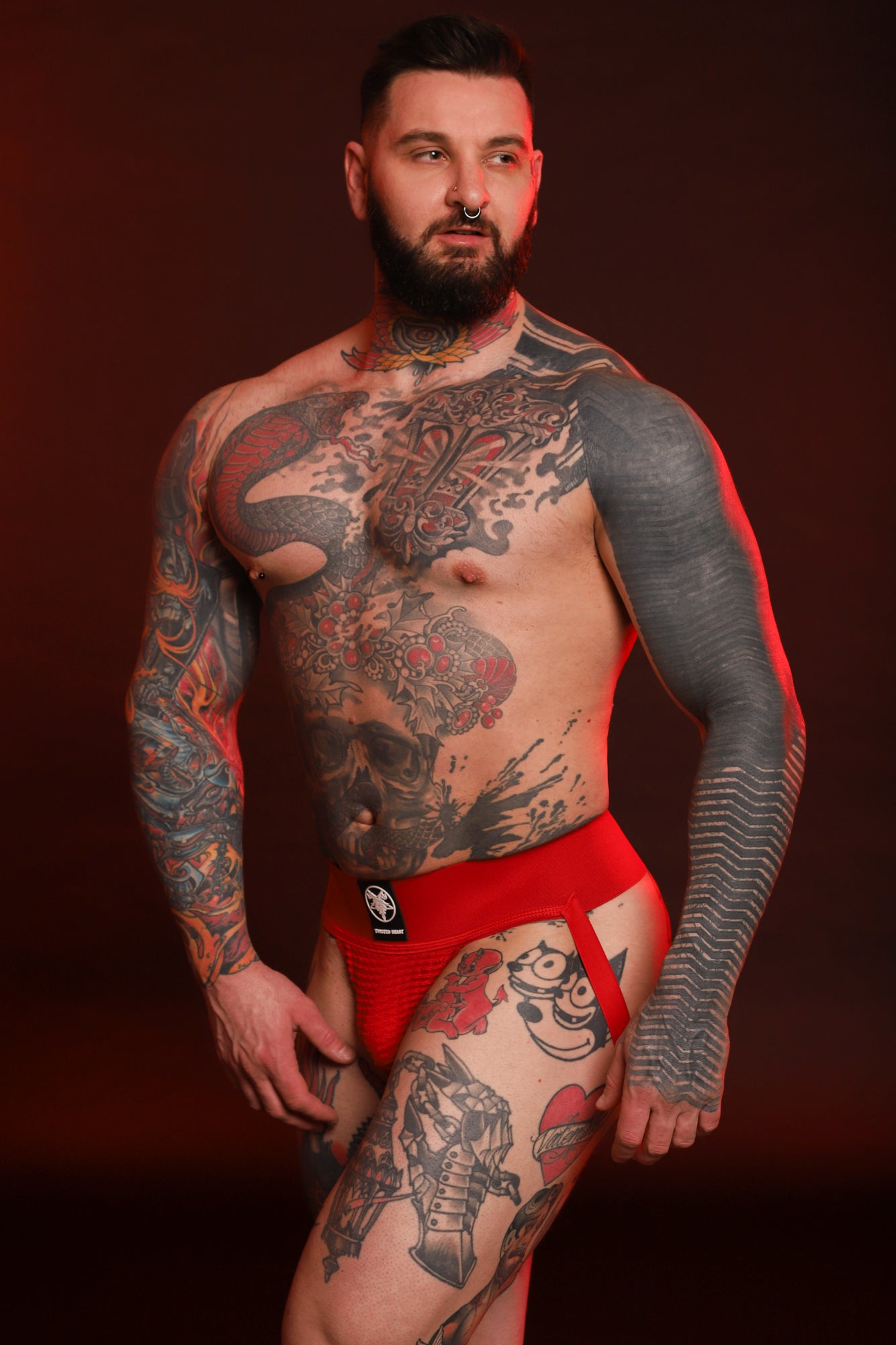 A model wearing a mesh Locker Jock in red.