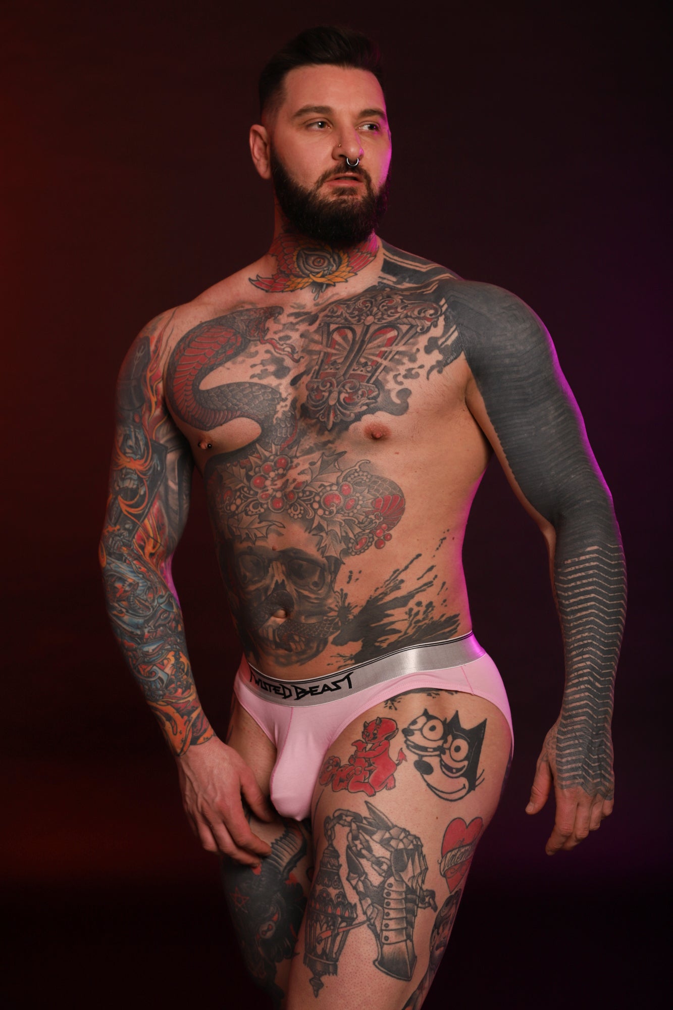 A pair of pink Y2K Briefs on a model.