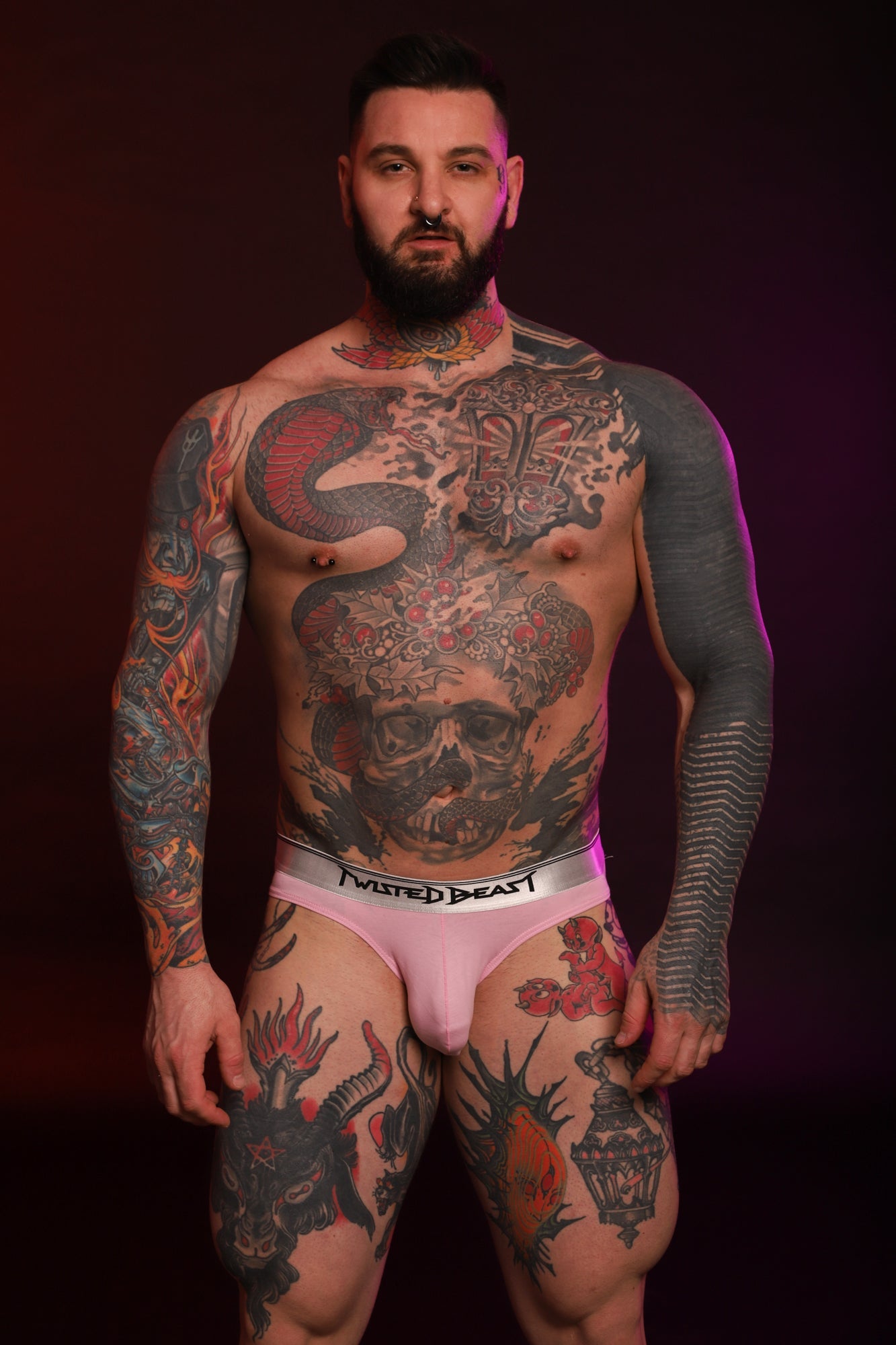 A model facing forward wearing a pair of Y2K Brief in Pink.